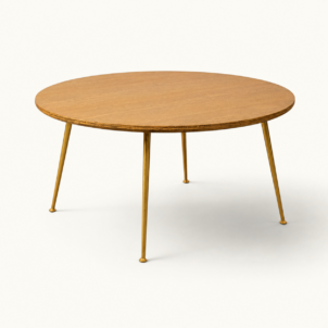 Round oak coffee table with gold legs for event hire