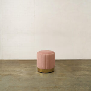 Velvet Pouffe in Pink with a Fluted Texture and Brass Trim