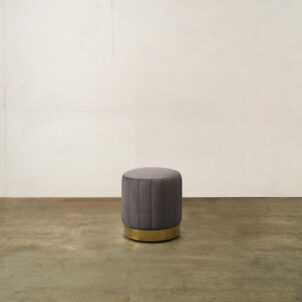 Velvet Pouffe in Silver Grey with a Fluted Texture and a Brass Trim