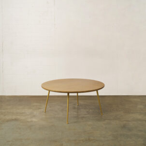 Round coffee table with gold legs and with flat feet for furniture event hire