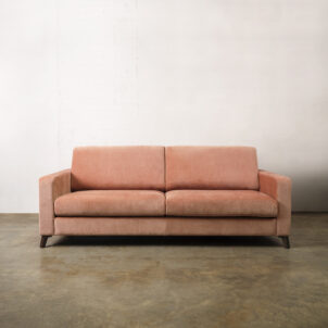 Dusky peach chenille sofa, large two seater with wooden legs