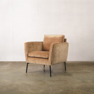 Pale rust chenille armchair with black metal legs