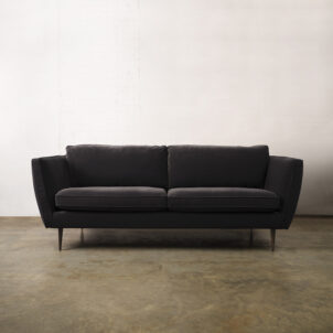 Black velvet sofa with wooden legs, three seater