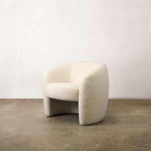 White boucle tubby armchair with round armrests